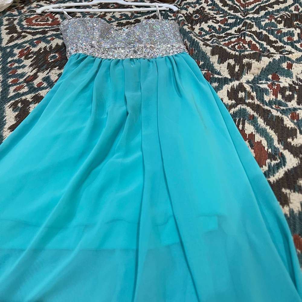 Beautiful teen long dress. Worn once for a high school dance.